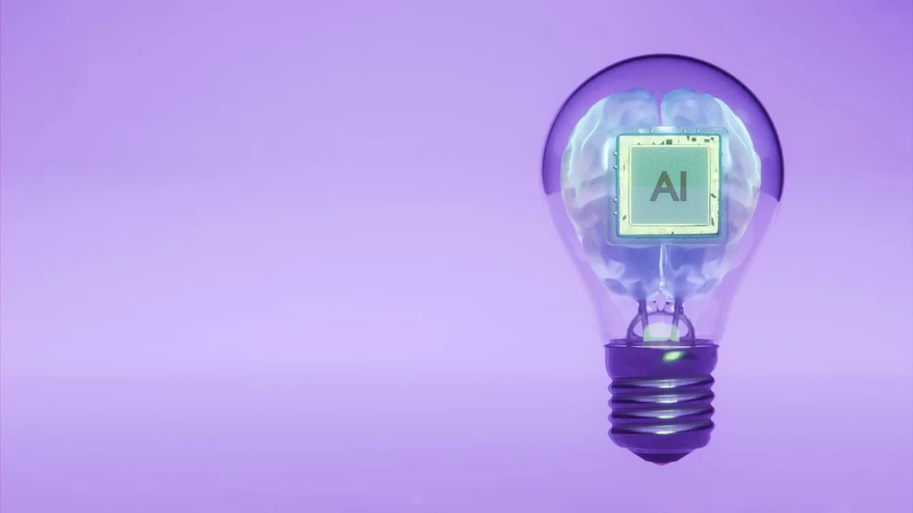 AI and human brain inside a lightbulb representing collaboration between artificial intelligence and human intelligence.